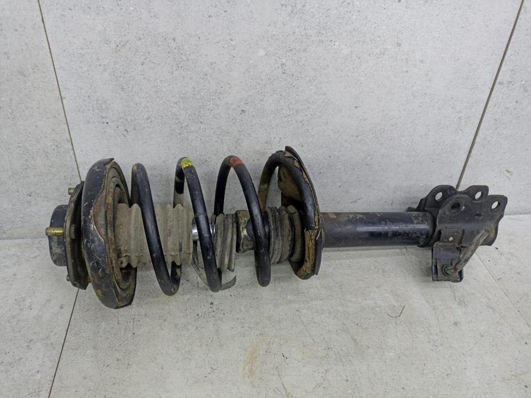 амортизатор передний левый Nissan X-Trail T30 (2000 - 2004), 543038H700 - фото №1