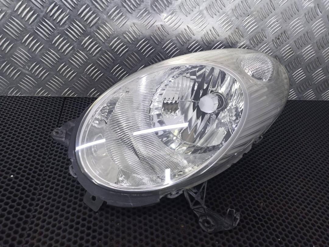 фара левая Nissan Micra 3 поколение (K12) 2003, 26060AX700 - фото №1