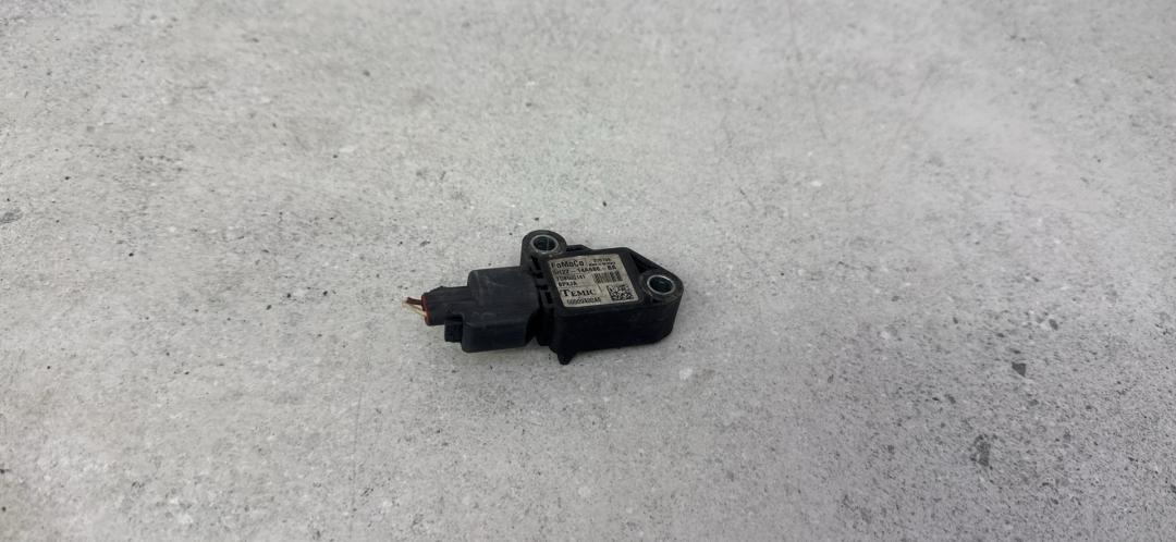 датчик удара Land Rover Range Rover 4 поколение (2012 - 2017), 5H2Z-14A686-BA - фото №1