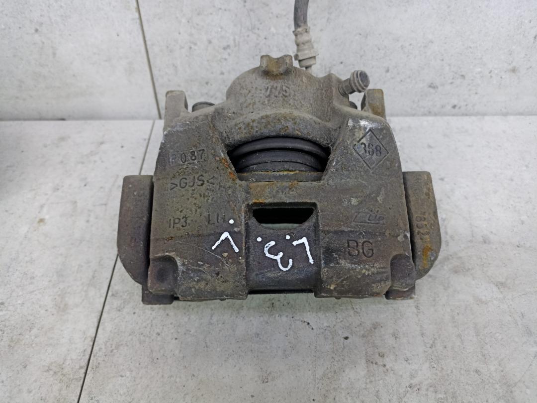 суппорт передний левый Renault Laguna 3 поколение 2010, 410110001R - фото №1