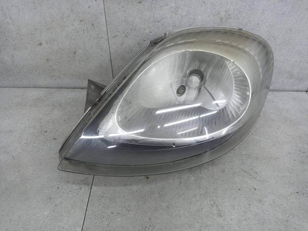 фара левая Renault Trafic 2 поколение 2003, 7700311371 - фото №1