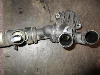 корпус термостата Volkswagen Passat B6 2006, 2.0 л., TFSI, BWA, бензин, МКПП, серый, универсал, передний привод, 06F121111F