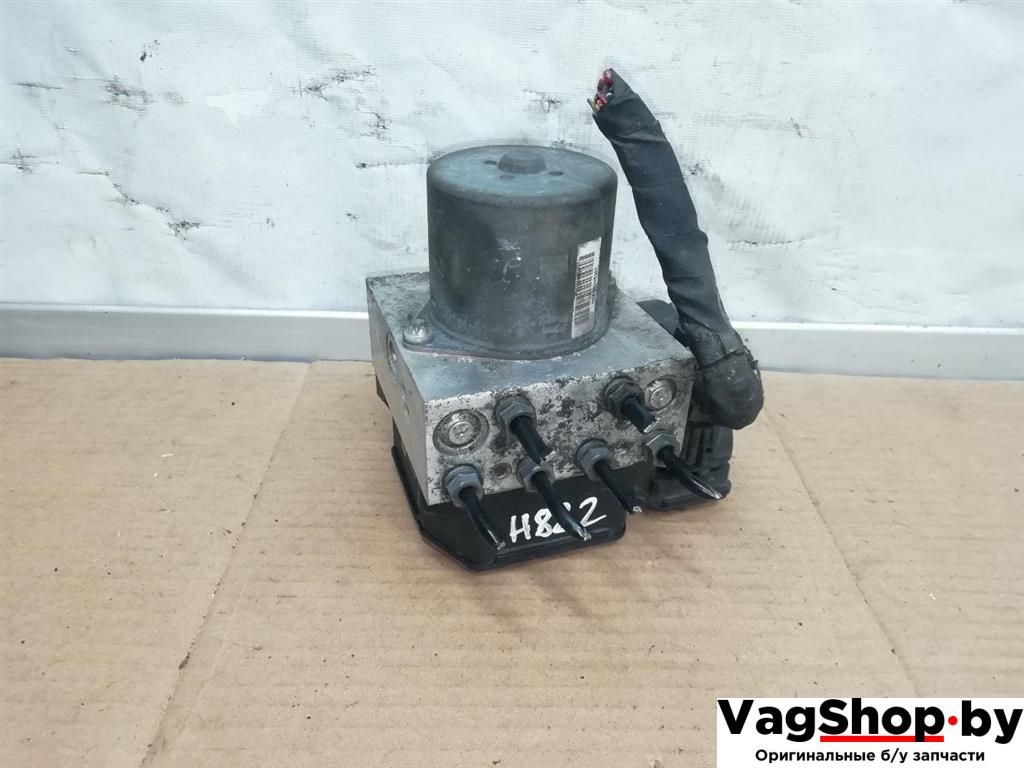 блок ABS Volkswagen Tiguan 1 поколение 2010, 2.0 л., TDi, CFG, дизель, МКПП, серебро, внедорожник 5 дв., полный привод, 5N0614109Q - фото №1