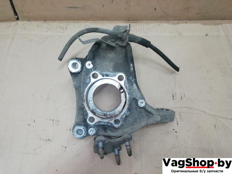 кулак поворотный левый Volkswagen Passat B6 2008, 2.0 л., TDi, CBA, дизель, МКПП, серебро, универсал, передний привод - фото №1