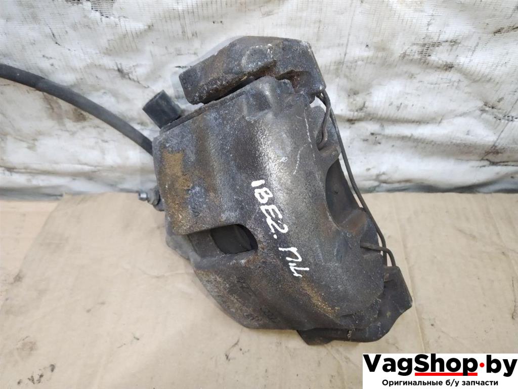 суппорт передний левый Volkswagen Touran 2 2013, 1.6 л., TDi, CAY, дизель, МКПП, черный, минивэн, передний привод - фото №1