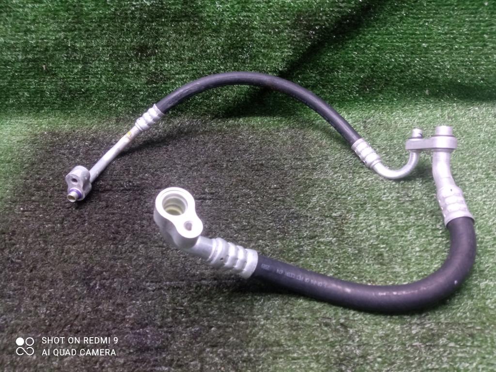 трубка кондиционера Opel Astra H рестайлинг (2006—2014) 2011, 1.4i Z14XEP, 13100321 - фото №1