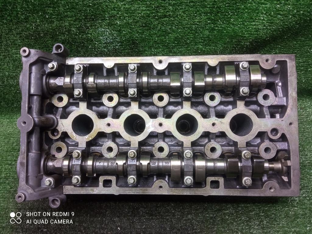 головка блока цилиндров Opel Astra J (2009—2012) 2011, 1.6T A16LET, 55568363 - фото №1