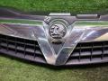 решетка радиатора Opel Astra GTC H рестайлинг (2006—2014) 2012, Название двигателя 1.6i Z16XER, 13247081 - фото №4