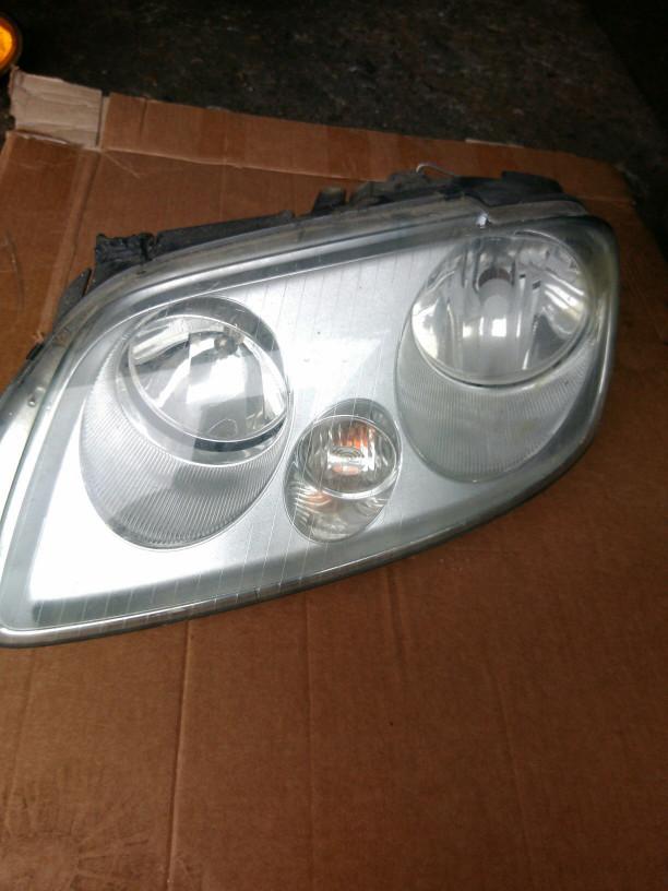 фара левая Volkswagen Touran 1 поколение 2006, 1.9 л., BKC, дизель, минивэн - фото №1