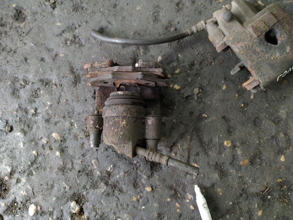 суппорт передний левый Volkswagen Golf 3 поколение 1996, 1.9 л., 1Y, дизель, хетчбэк 5 дв. - фото №1