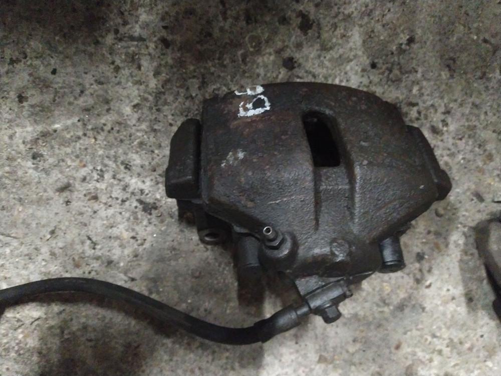 суппорт передний правый Volkswagen Passat B6 2006, 1.9 л., дизель, универсал - фото №1