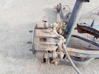 суппорт задний левый Hyundai i30 1 поколение [рестайлинг] 2012