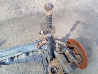 амортизатор задний Renault Laguna 3 поколение 2010