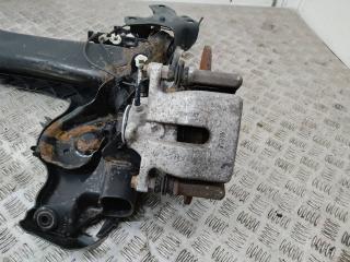 Суппорт тормозной задний (в балке) левый Renault Megane 3 поколение [2-й рестайлинг] 2015, 1.5 л., дизель, хетчбэк 5 дв.