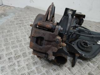 Суппорт тормозной задний (в балке) левый Nissan Juke YF15 [рестайлинг] 2014, 1.5 л., дизель